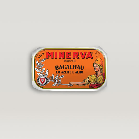 A hand-canned tin label with the word Minerva on it, containing Codfish in Olive Oil And Garlic.