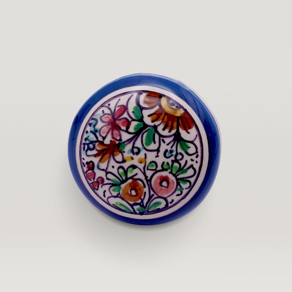 A XVII Century Wine bottle stopper with a floral pattern on a white background by Tejo Shop.