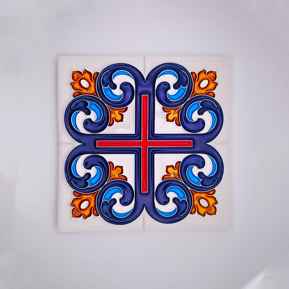 A decorative Cruzade Ceramic Tile from Tejo Shop featuring a symmetrical design with a blue and orange motif, centered around a red cross, on a white background.