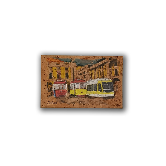 The Trams Painting on Cork - Fridge Magnet by New Jamp features two iconic Lisbon trams on a city street with yellow buildings and a blue sky. "Lisboa" is printed in the corner, making it a perfect Lisbon souvenir.