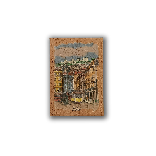 The New Jamp "Painting of Lisbons on Cork" fridge magnet features a vibrant Lisbon street scene with a yellow tram, historic buildings, and "Lisboa" at the bottom—a perfect souvenir capturing Rossio’s charm.