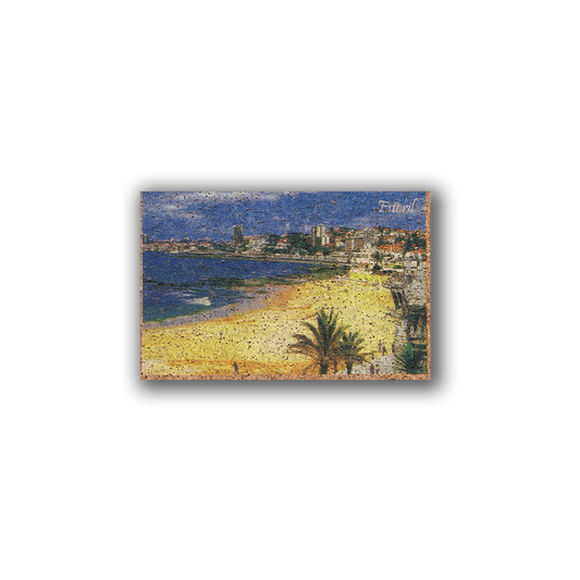 The New Jamp "Estoril Beach" Cork Fridge Magnet features Portugal’s coastline with sandy beaches, blue waves, palm trees, and city buildings beneath a bright sky. “Festival” is printed in the upper right corner on this eco-friendly accessory.