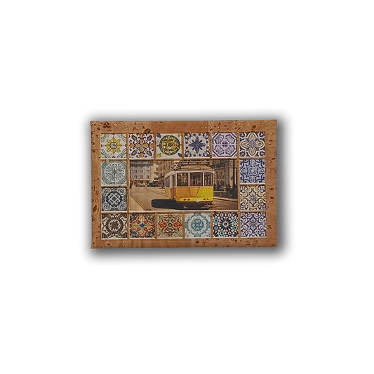 The Lisbon Tiles - Cork Fridge Magnet by New Jamp features a yellow tram on a city street, framed by vibrant patterned tiles—an eco-friendly keepsake or memento from Cascais.
