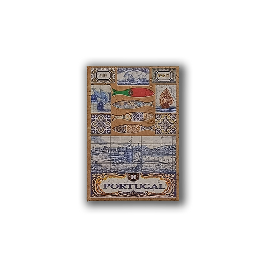 The Tiles and Sardines Cork Fridge Magnet by New Jamp features blue and white Portuguese tiles, a Lisbon tram, sailing ship, flag-colored fish, and scenic art representing Portugal’s culture and heritage.