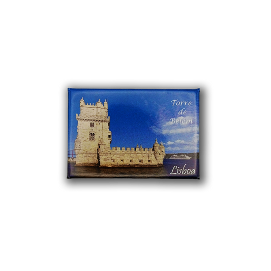 The New Jamp Tower of Belém - Fridge Magnet displays a photo of Lisbon's Belém Tower under a blue sky, with "Torre de Belém" and "Lisboa" in white text on the upper right corner.