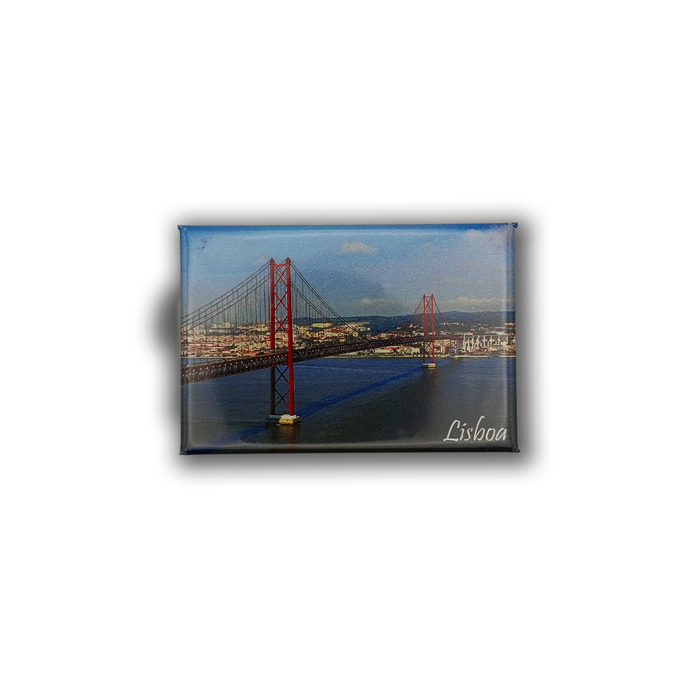 The New Jamp 25th April Bridge - Fridge Magnet features Lisbon's iconic bridge over the river with city buildings and “Lisboa” in white script—a perfect Portugal keepsake for celebrating Portuguese heritage.