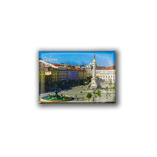 The Rossio Square - Fridge Magnet by New Jamp showcases Lisbon’s iconic square with historic buildings, fountain, statues, and "Lisboa" in white text on a blue sky—a vibrant keepsake of the city.