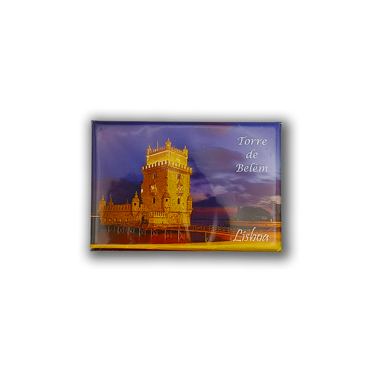 The New Jamp Tower of Belém by Night Fridge Magnet displays an illuminated image of the landmark in Lisbon, with "Torre de Belém" and "Lisboa" text, capturing Portuguese heritage against a twilight sky.