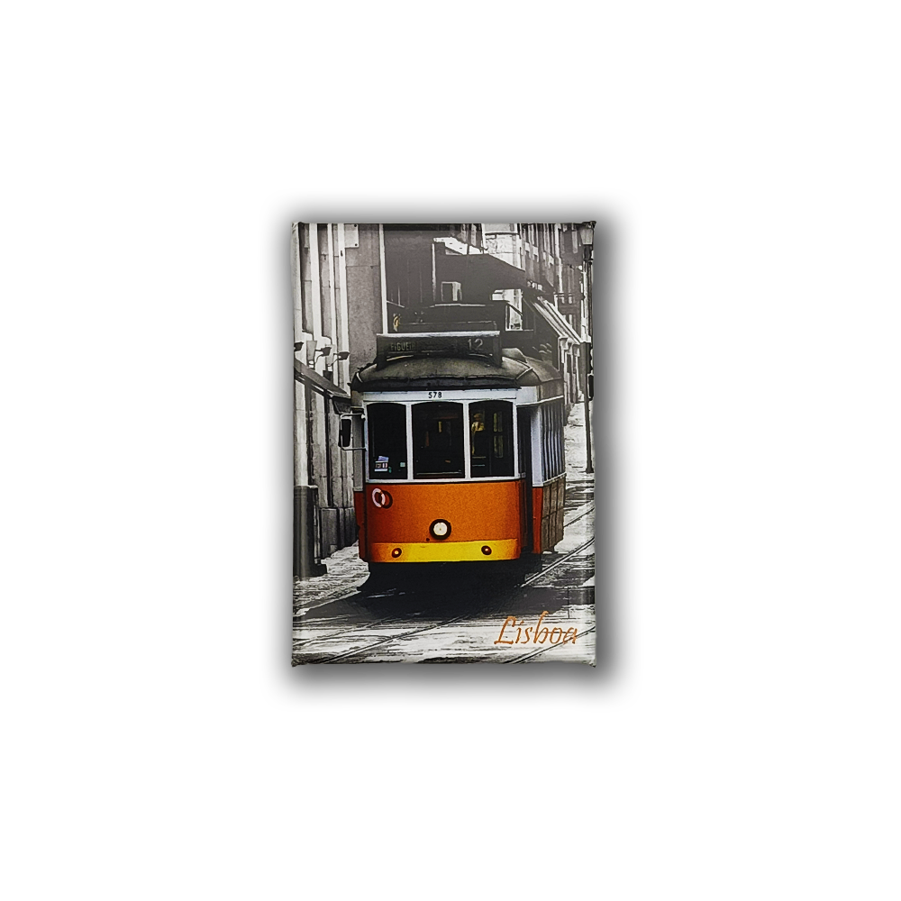 The Lisbon Tram - Fridge Magnet by New Jamp features a yellow and white tram on a cobblestone street in Lisbon. The black and white background highlights the vibrant tram. “Lisboa” is printed in orange at the bottom right—ideal fridge decor.
