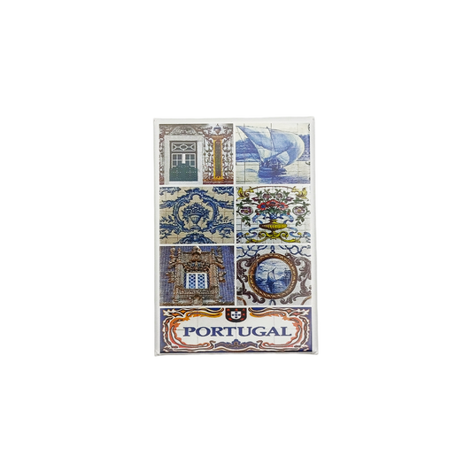The New Jamp Portuguese Art Fridge Magnet displays six traditional blue and white designs inspired by Portugal, featuring a sailing ship, a castle, ornate patterns, and "Portugal" at the bottom.