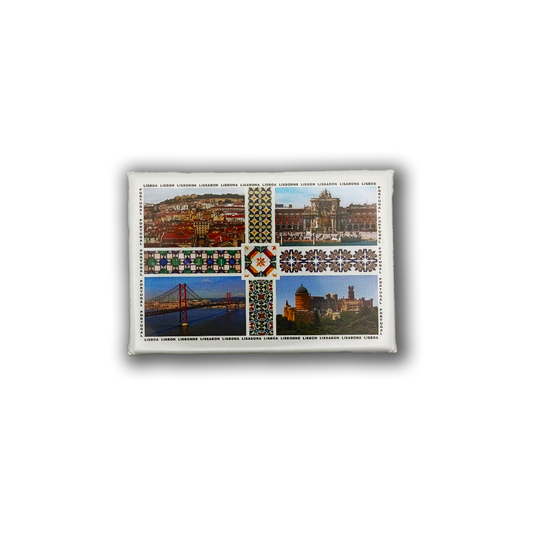 The New Jamp Pena Palace & Lisbon fridge magnet showcases Lisbon’s notable bridges and historic architecture, featuring cityscape images, traditional patterns, and "Lisabon" printed along the decorative borders.